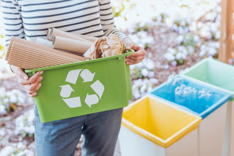 Recycling to reduce landfill waste.